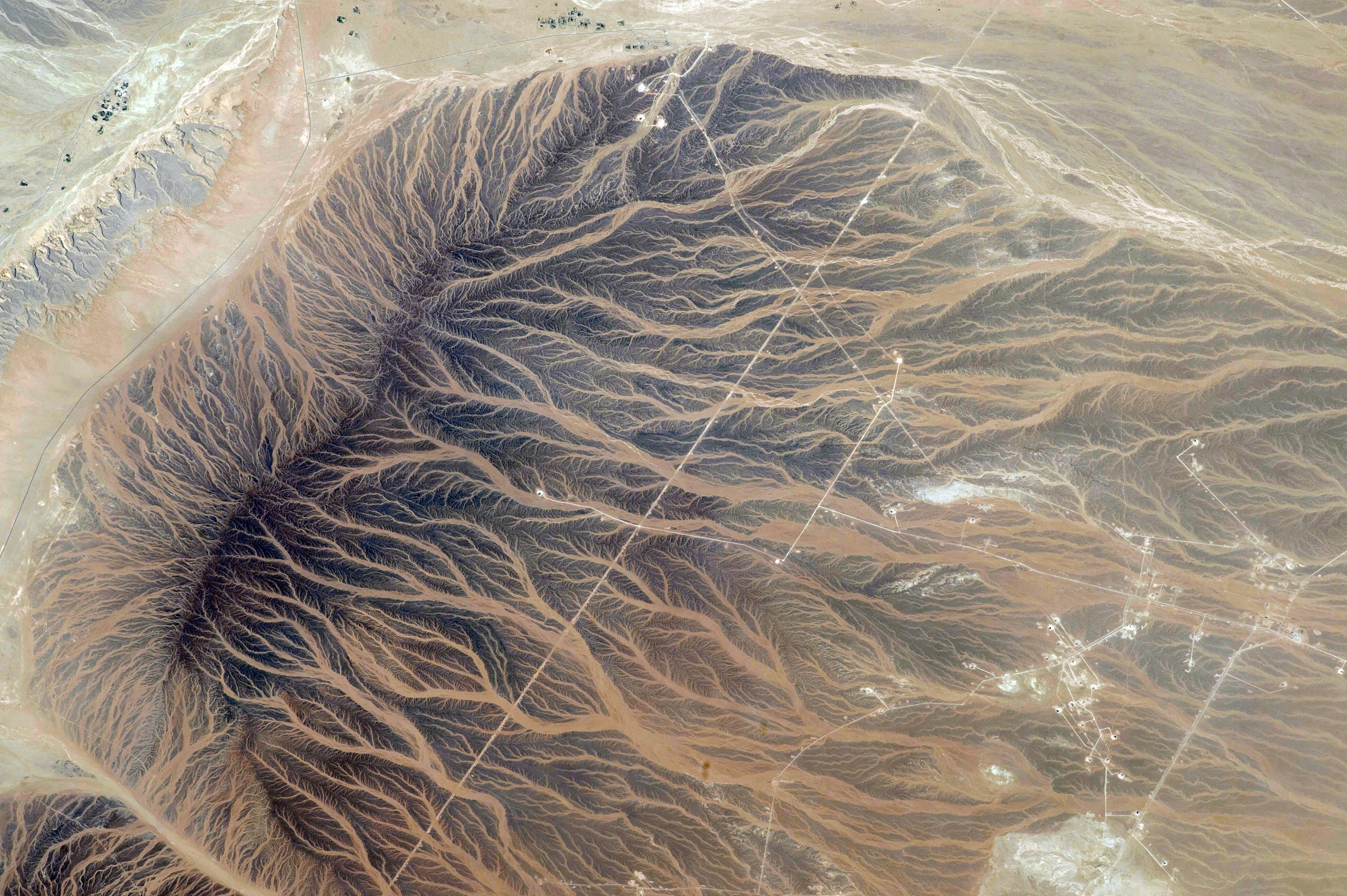 Fingerprints of Water on the Sand, by NASA, 2015.